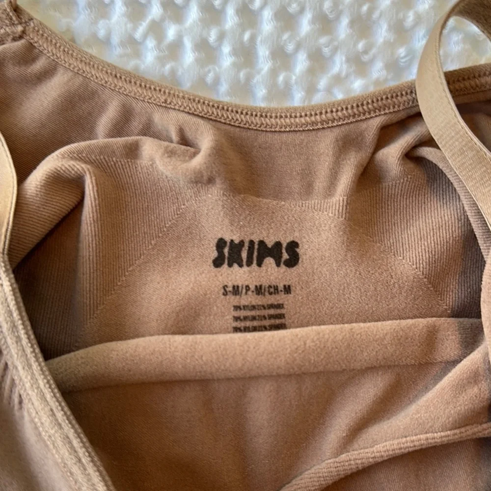 SKIMS Tan Bodysuit with Ruched Front and Halter Straps - Picture 2 of 2